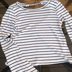 White/black stripped, long sleeved blouse.